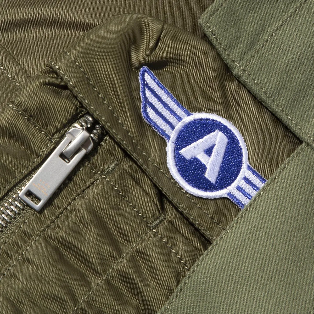 x Alpha Industries PACKABLE MA-1 JACKET W/ HOOD